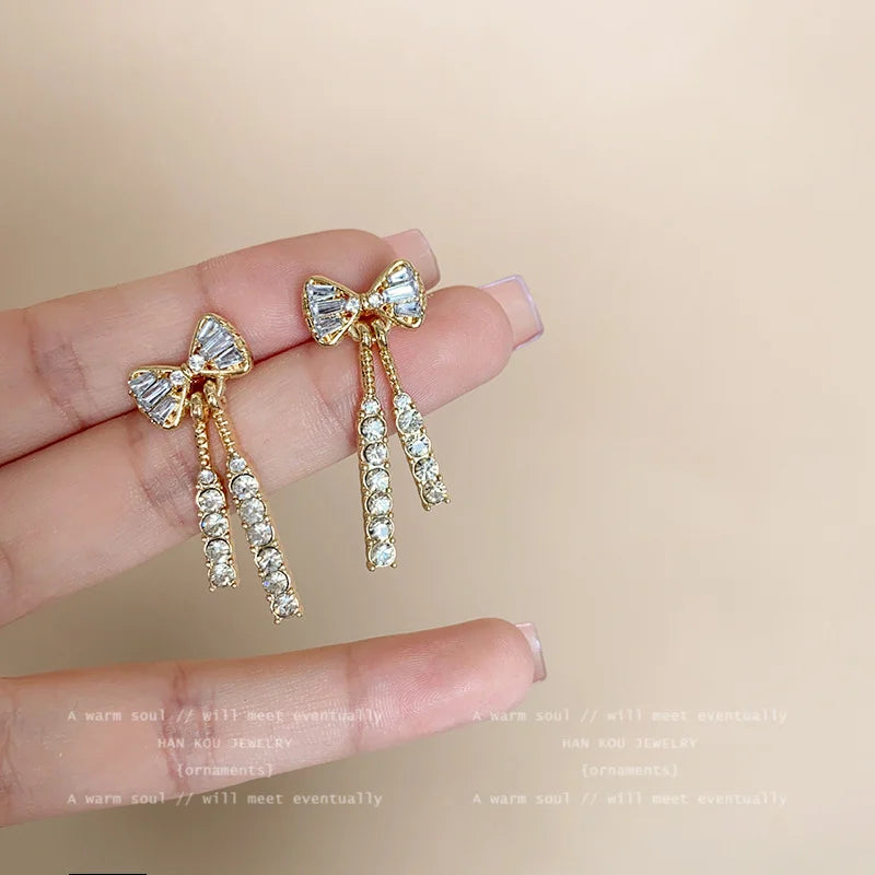 Elena™ | Gold Bow Tassel Earrings with Rhinestones