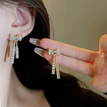 Elena™ | Gold Bow Tassel Earrings with Rhinestones